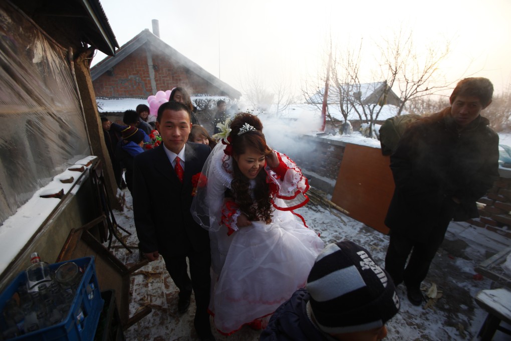 The sight of a happy couple on their wedding day is an increasingly rare sight in rural China. Photo: Getty