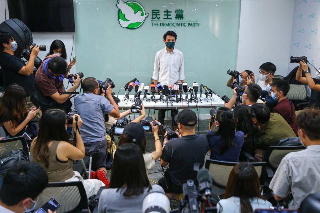 Democratic Party chairman Lo Kin-hei tells reporters no decision has been made on whether to contest the coming Legislative Council poll after a meeting last month. Photo: Dickson Lee