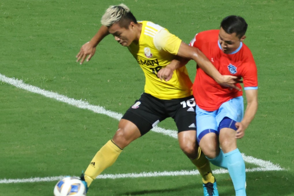 Lee Man’s Ngan Lok-fung (yellow) against Enkhbileg Purevdorj of Athletic 220 from Mongolia in the 2021 AFC Cup group match at Tseung Kwan O Sports Ground. Photo: K.Y. Cheng