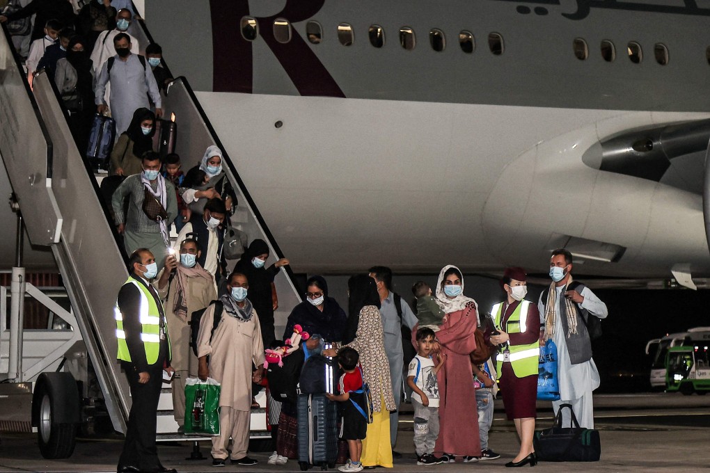 Evacuees from Afghanistan, including US citizens, arrive at Hamad International Airport in Qatar's capital Doha on September 9. File photo: AFP