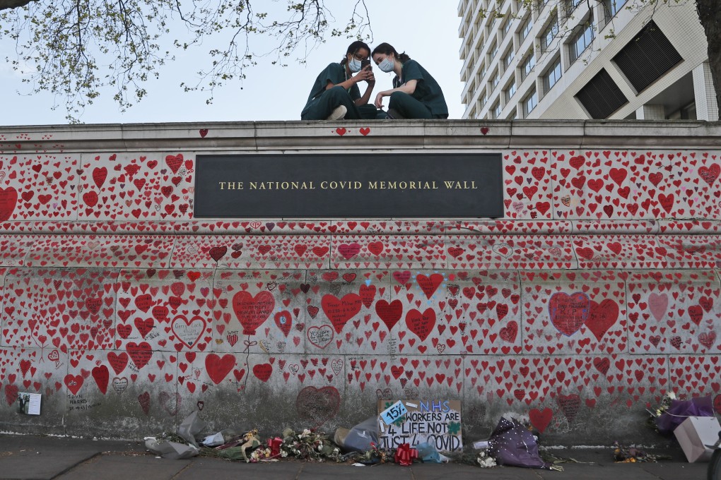 The National Covid Memorial Wall in London. Covid-19 is still killing hundreds of people every week in Britain. Photo: AP