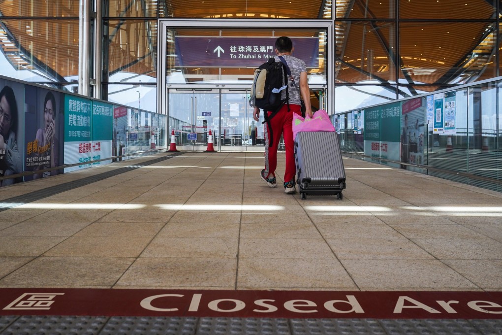 A traveller at the Hong Kong-Zhuhai-Macau Bridge. Discussions on how to resume quarantine-free travel have increased in recent weeks. Photo: Sam Tsang
