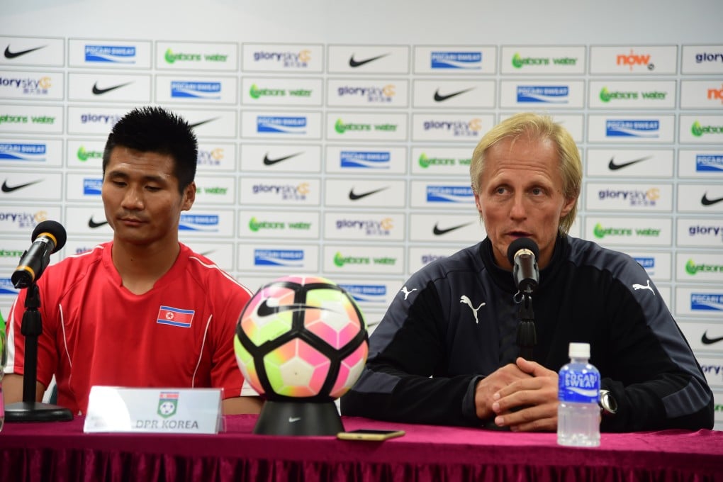 Jorn Andersen and North Korean player Pak Kwang-ryong at the prematch press conference of the Asian Cup qualifiers against Hong Kong in 2017. Photo: Chan Kin-wa