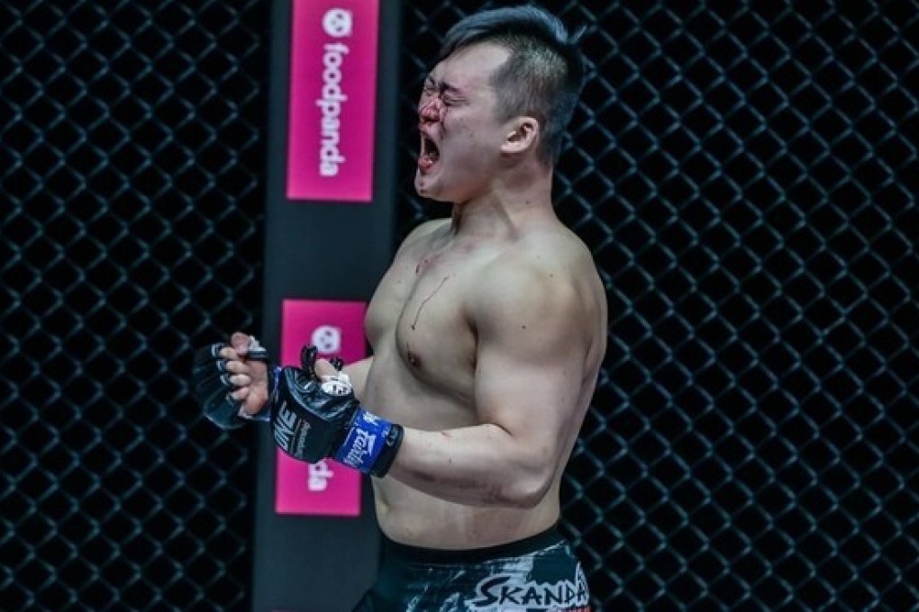 Kang Ji-won celebrates knocking out Amir Aliakbari. Photos: ONE Championship