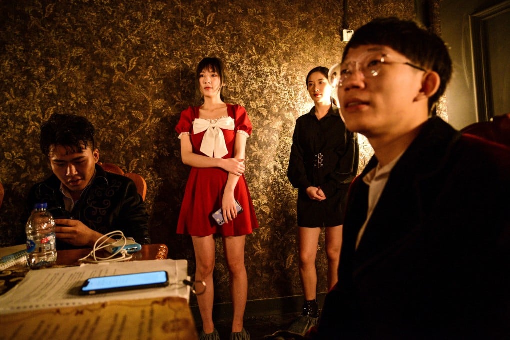 Players taking part in a live action role-play a murder mystery game called The Haunted Mansion at a role play studio in Shanghai. Photo: AFP