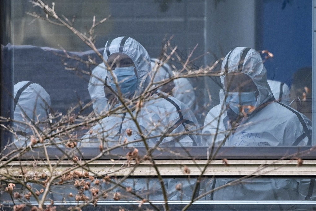 Members of the WHO team investigating the origins of the virus visit the centre for animal disease control and prevention in Wuhan in February. Photo: AFP