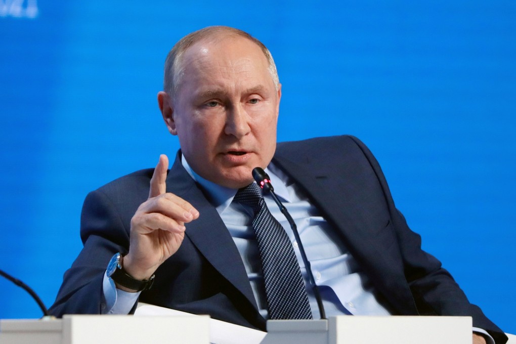 Russian President Vladimir Putin speaks during a plenary session of the Russian Energy Week International Forum in Moscow on Wednesday. Photo: Sputnik via Reuters