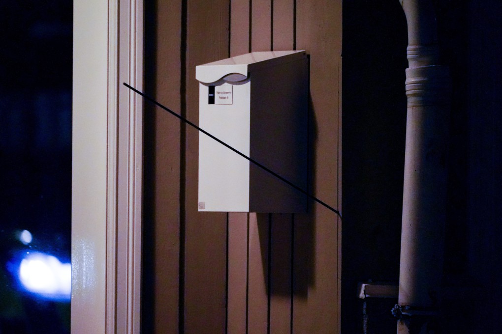 An arrow left in a wall after an attack in Kongsberg, Norway on Wednesday. Photo: NTB Scanpix via AP