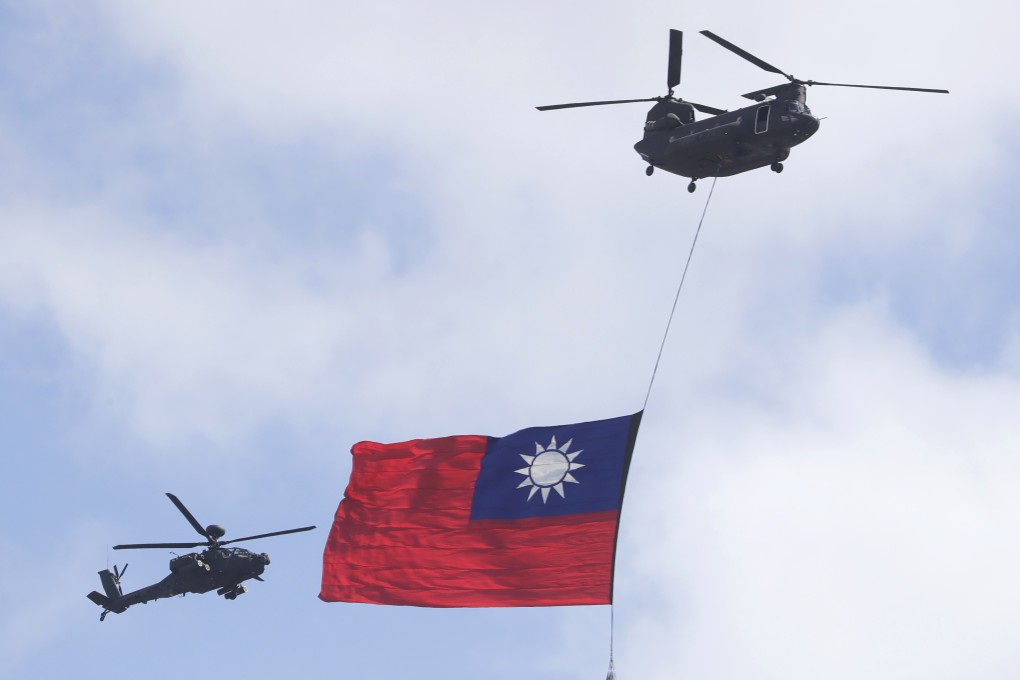 Helicopters fly in front of the presidential building in Taipei on Sunday, the Double Tenth holiday. Photo: AP
