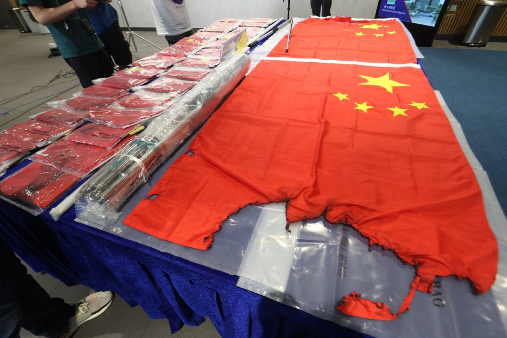 A man was arrested on suspicion of desecrating dozens of national flags in Wong Tai Sin earlier this month. Photo: Handout