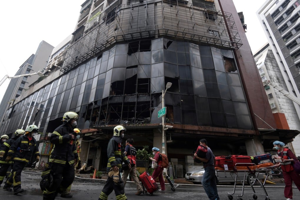Kaohsiung police suspect the fire at the former department store may have been caused by burning sandalwood powder. Photo: Reuters