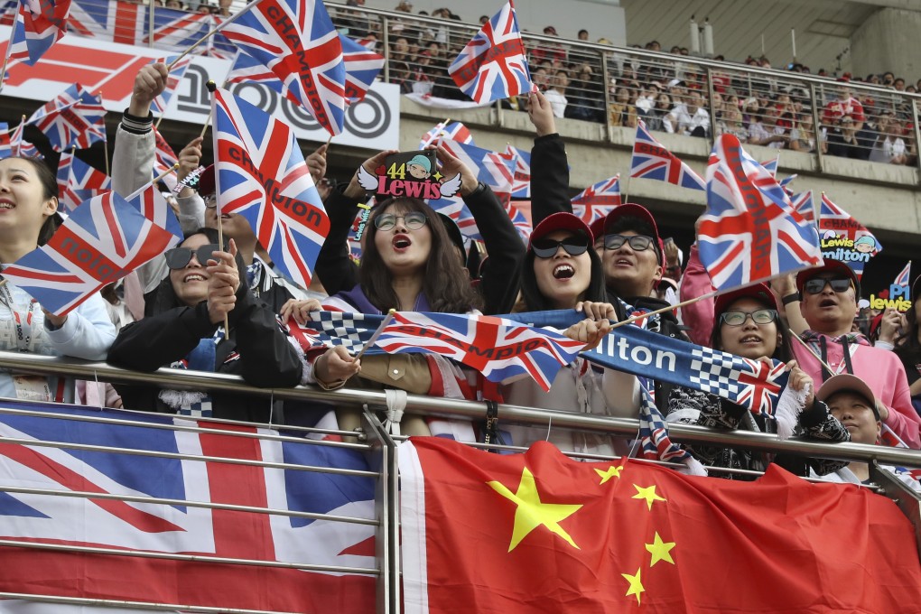 Fans of Mercedes driver Lewis Hamilton cheer during the qualifying session for the Chinese Formula One Grand Prix at the Shanghai International Circuit on April 13, 2019. Photo: AP