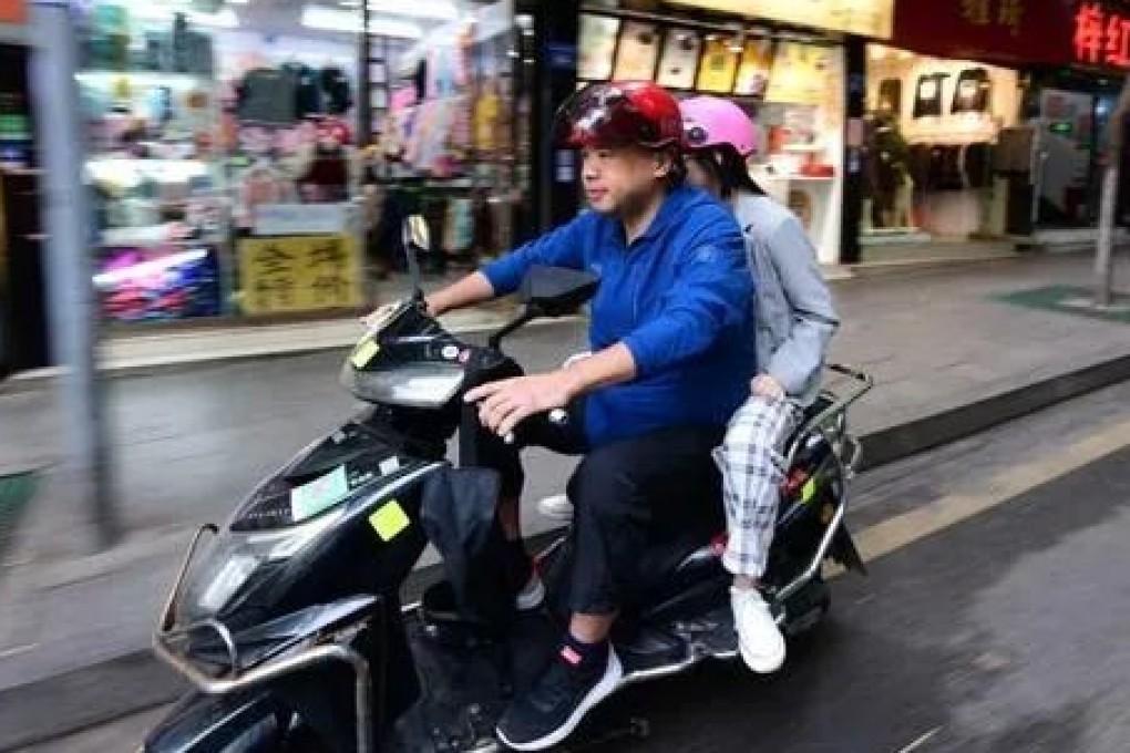 English-language tutor provides motorcycle ride service after job loss receives praise for his resilience. Photo: The Paper