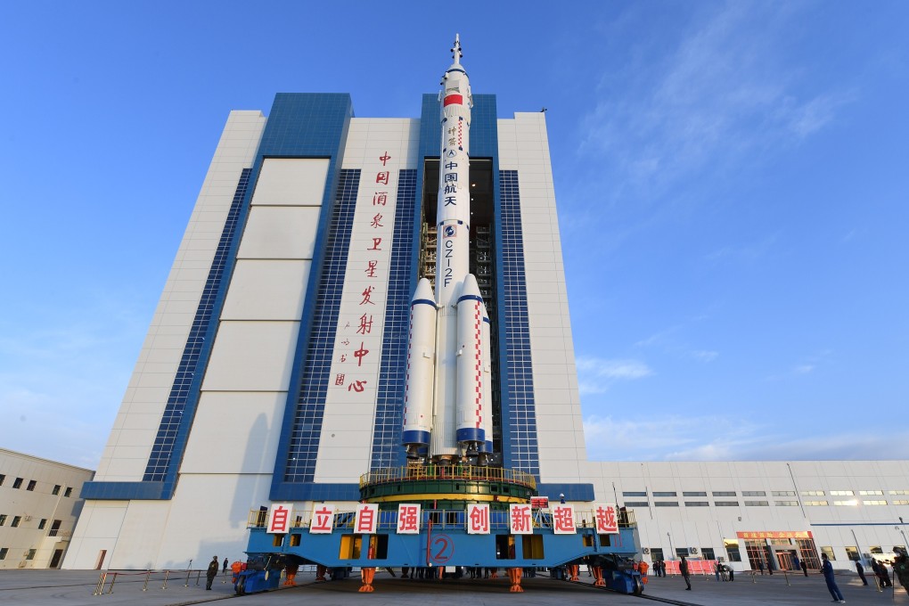 The Shenzhou 13 spacecraft and a Long March 2F Y13 carrier rocket are prepared for transfer to the Jiuquan launch site in northern China on Thursday. The launch is expected on October 16, according to sources. Photo: Xinhua