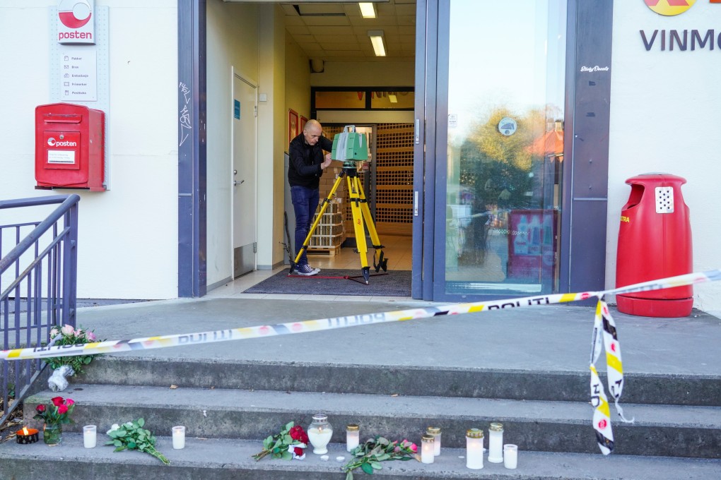 A police officer investigates at a grocery store in the Norwegian town of Kongsberg after a man went on a violent rampage on Wednesday, killing five people. Photo: Reuters