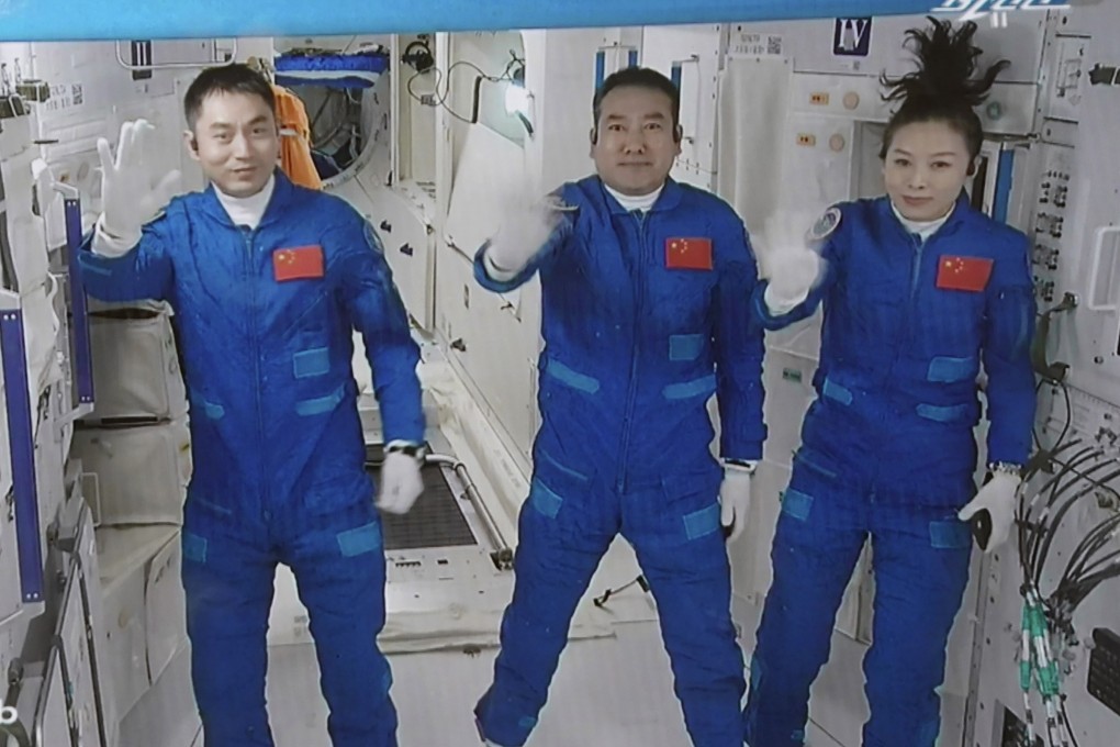 From left, Chinese astronauts Ye Guangfu, Zhai Zhigang and Wang Yaping settle in after entering the space station core module on Saturday. Photo: Xinhua