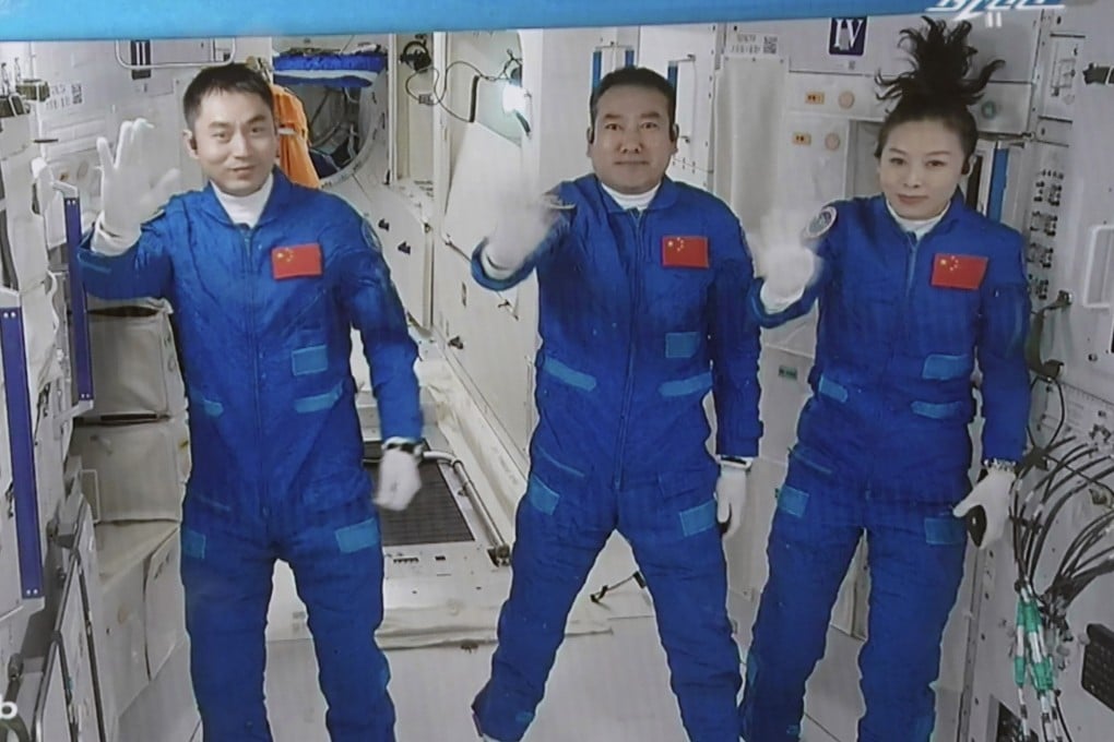 From left, Chinese astronauts Ye Guangfu, Zhai Zhigang and Wang Yaping settle in after entering the space station core module on Saturday. Photo: Xinhua