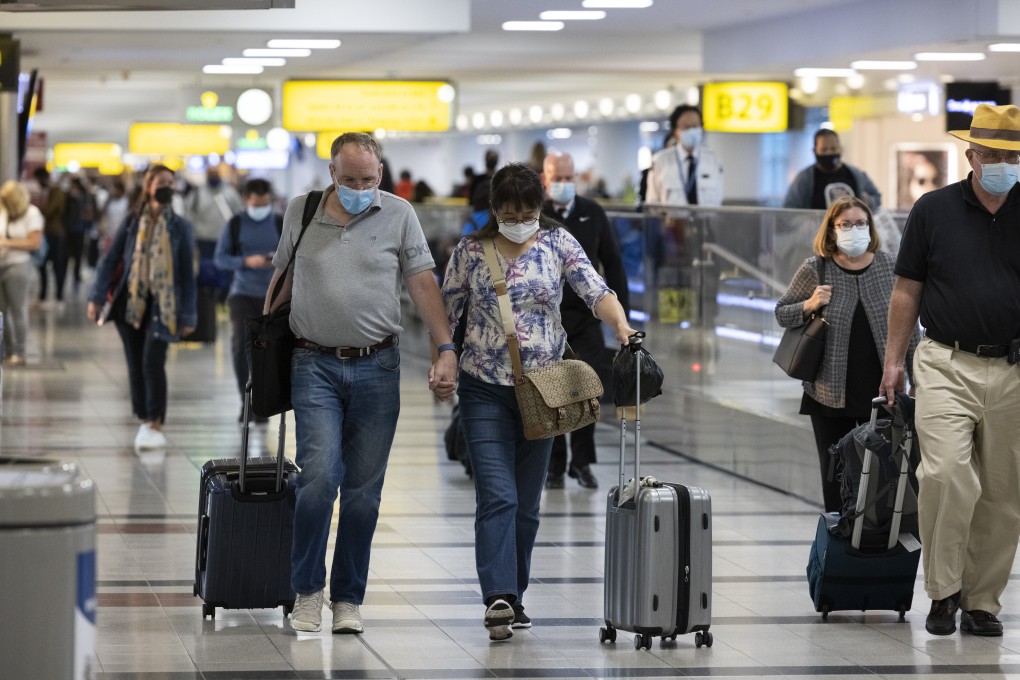 Travellers walk through New York’s John F. Kennedy Airport in September. Photo: Bloomberg