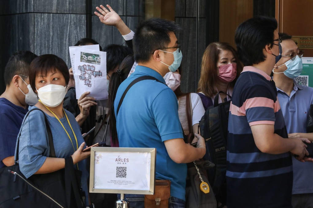 Buyers, largely end users, line up on the second day of sales at The Arles. Photo: Jonathan Wong
