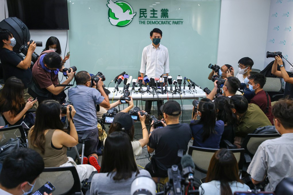 Democratic Party chairman Lo Kin-hei tells reporters no decision has been made on whether to contest the coming Legislative Council poll after a meeting last month. Photo: Dickson Lee