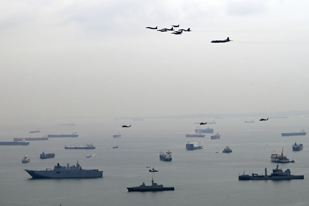 Aircraft from the Five Power Defence Arrangements (FPDA) member-nations take part in a flypast to mark the pact’s 50th anniversary in Singapore. Photo: AFP
