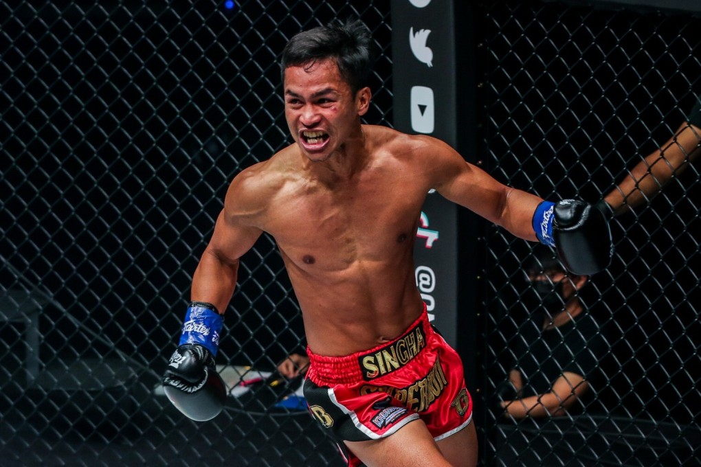 Superbon rings around the cage in celebration after knocking out Giorgio Petrosyan. Photo: ONE Championship
