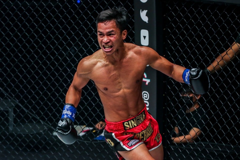 Superbon rings around the cage in celebration after knocking out Giorgio Petrosyan. Photo: ONE Championship