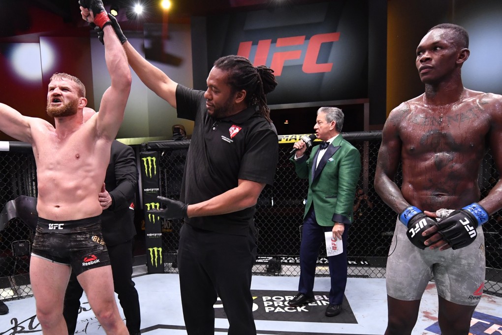 Jan Blachowicz celebrates after his victory over Israel Adesanya in their light heavyweight title fight at UFC 259 in Las Vegas, Nevada. Photos: Jeff Bottari/Zuffa LLC
