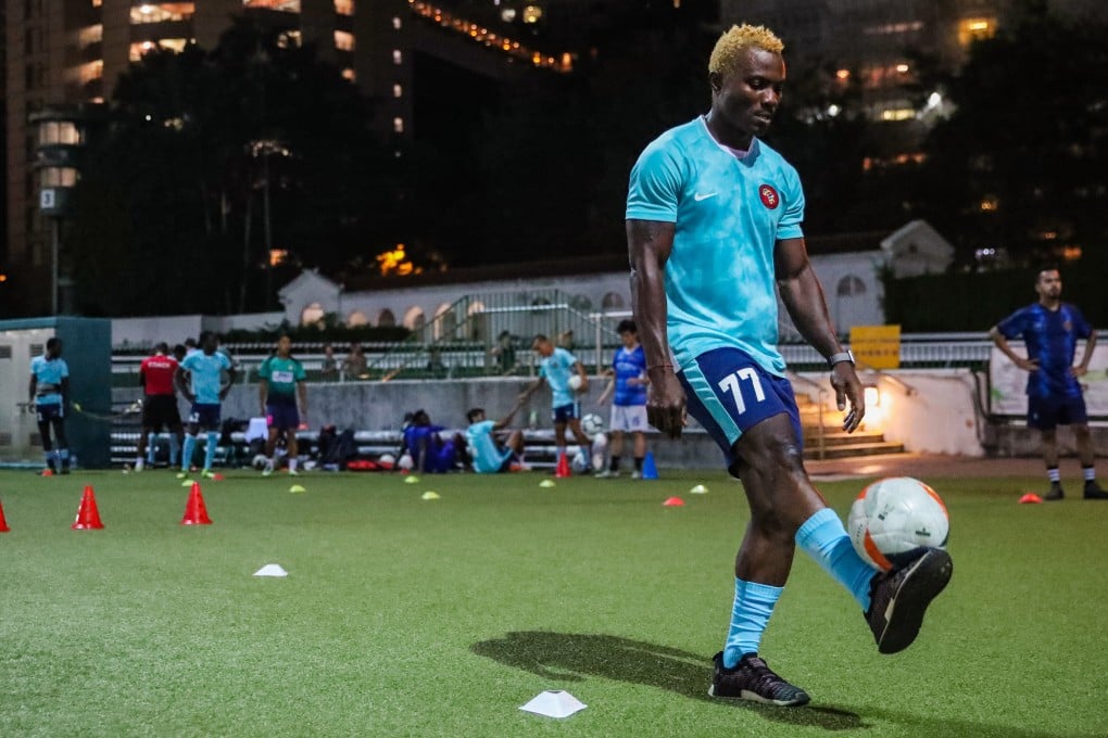 Tita Valdo, a member of Africa United, trains at Happy Valley pitch. He said football has been an immense help in him start a new life in Hong Kong. Edmond So