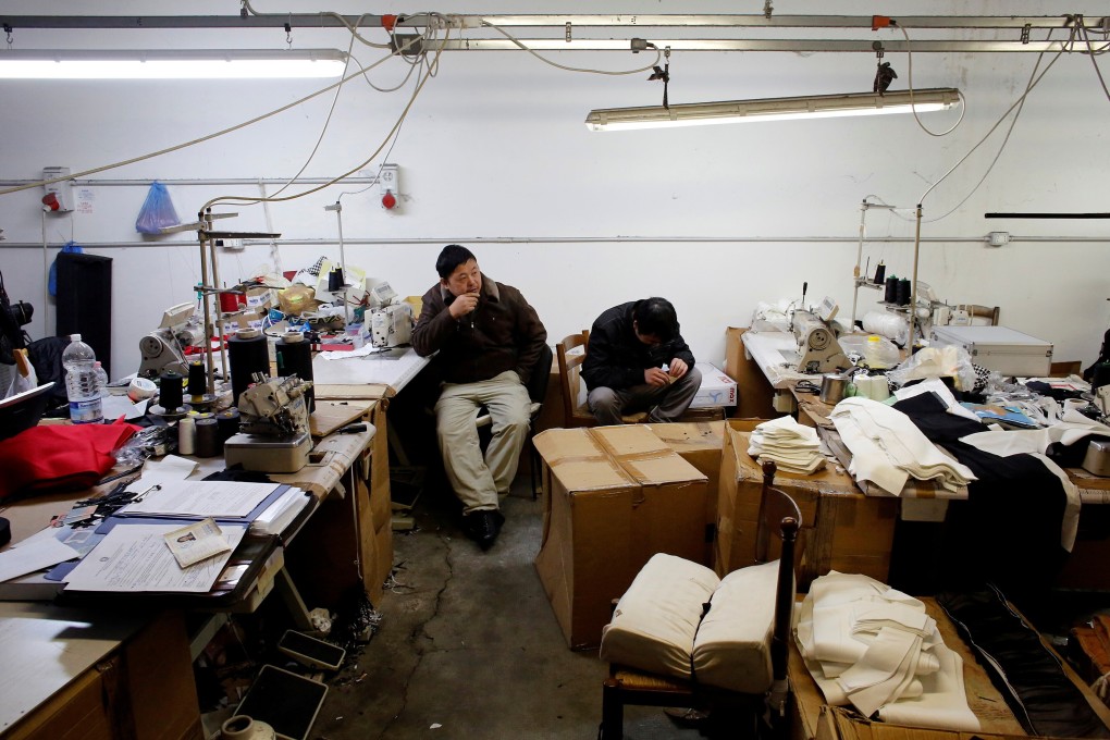 Chinese immigrant workers at a textile factory in Prato, Italy in 2013. The government’s Green Pass is preventing many Chinese from going to work. File photo: Reuters