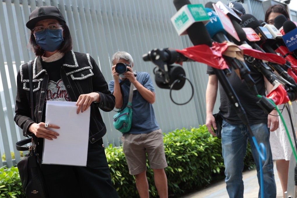 The mother of Poon Hiu-wing meets the media outside government headquarters in Admiralty on Wednesday. Photo: Sam Tsang