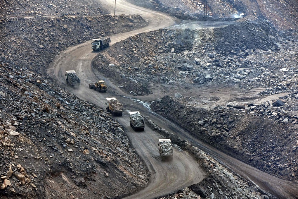 Trucks loaded with coal are seen at the Jharia coalfield in India’s Jharkhand state. Coal accounted for 70 per cent of India’s electricity generation in 2020. Photo: AFP