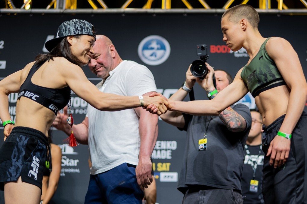 Zhang Weili and Rose Namajunas shake hands at the UFC 261 weigh-in. Photo: Zuffa LLC