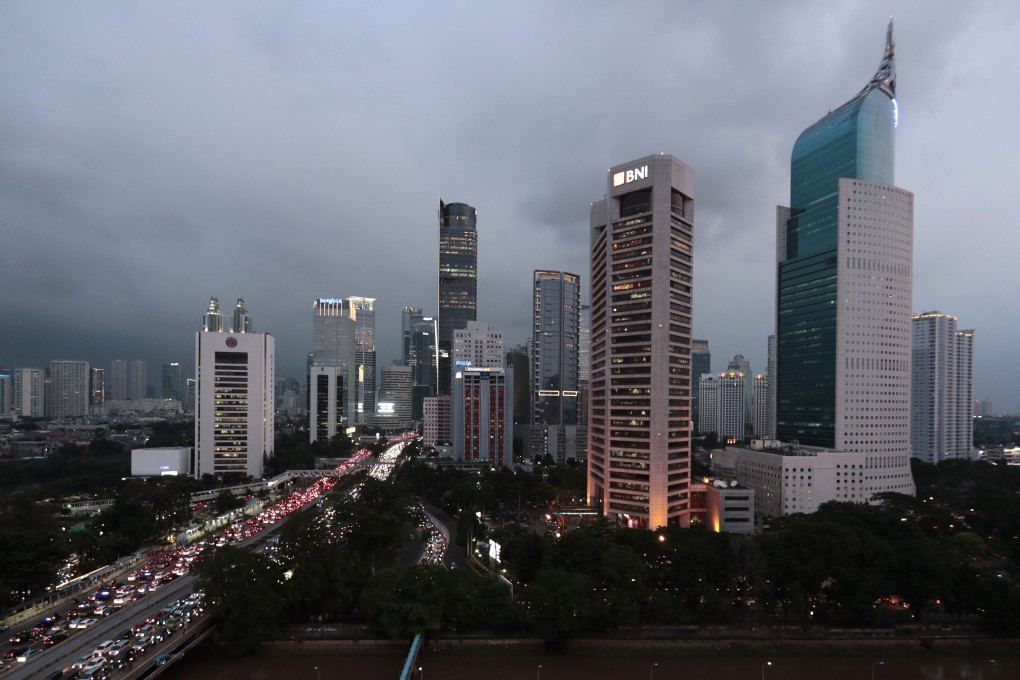 Jakarta’s central business district is seen during dusk. Developers are betting on the country’s young population to drive the property market recovery. Photo: AP Photo