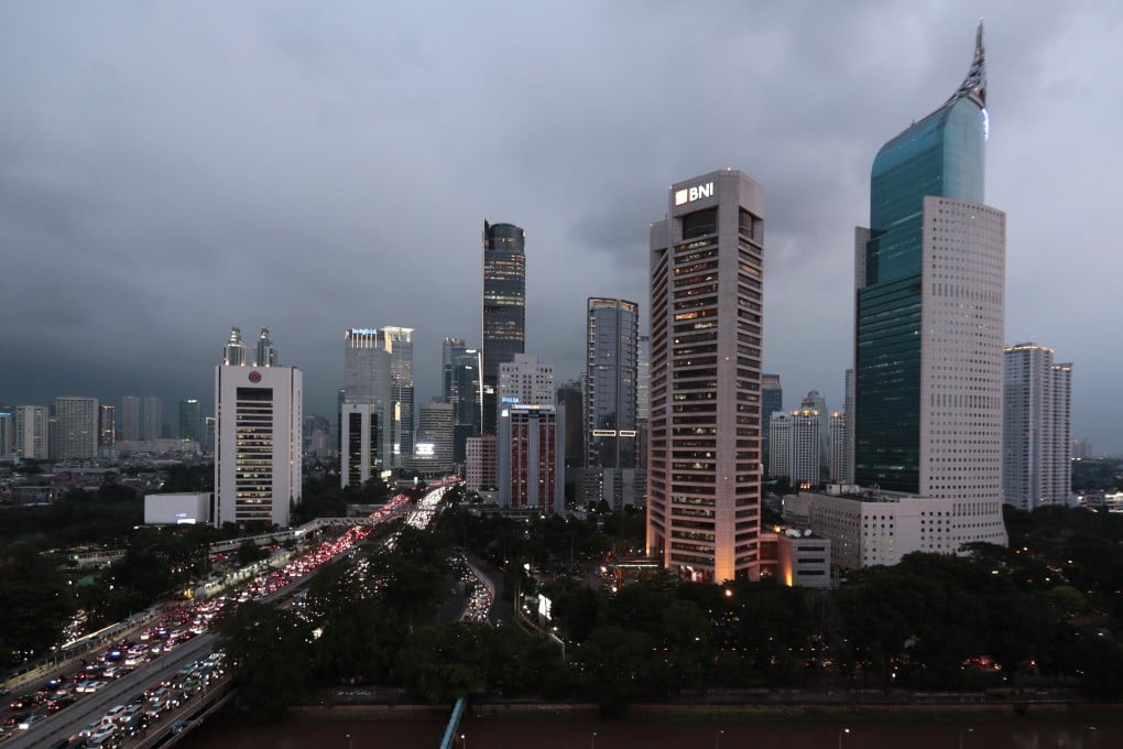 Jakarta’s central business district is seen during dusk. Developers are betting on the country’s young population to drive the property market recovery. Photo: AP Photo