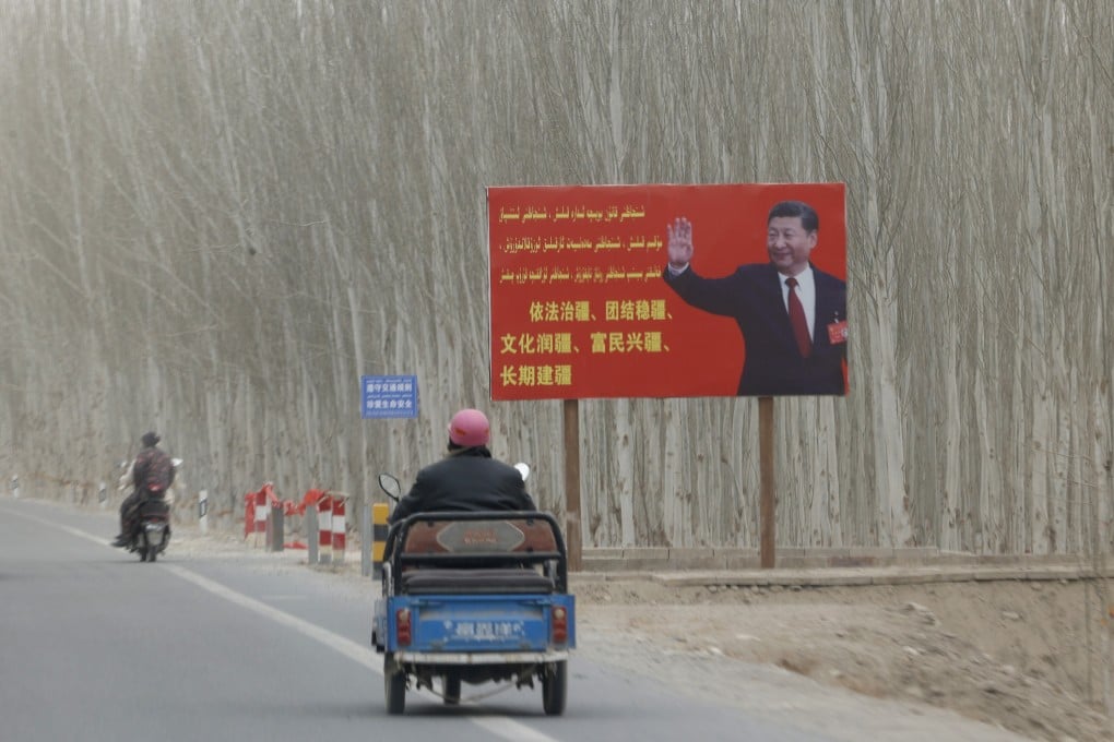 A billboard featuring Chinese President Xi Jinping features on a highway in Yarkent county in the Xinjiang Uygur autonomous region. Photo: AP