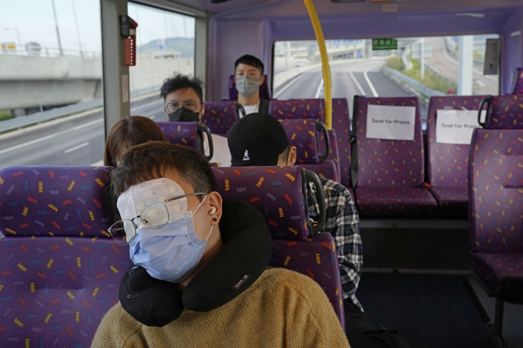 A passenger naps on the upper deck of a Hong Kong bus taking local tourists on a 76km, five-hour ride meant to lull them to sleep. Photo: AP