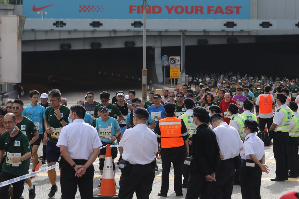 Runners of the 2021 Standard Chartered Hong Kong Marathon pass Western Harbour Tunnel. Photos: Xiaomei Chen