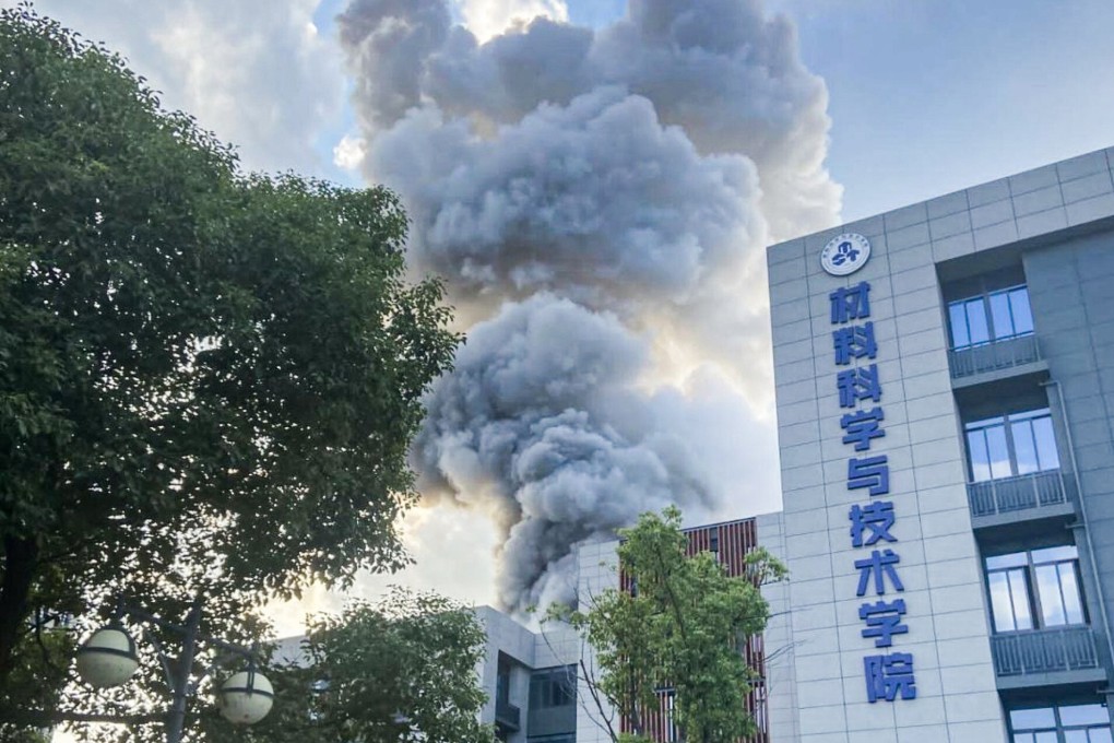 Smoke was seen billowing from the lab following the blaze. Photo: Weibo