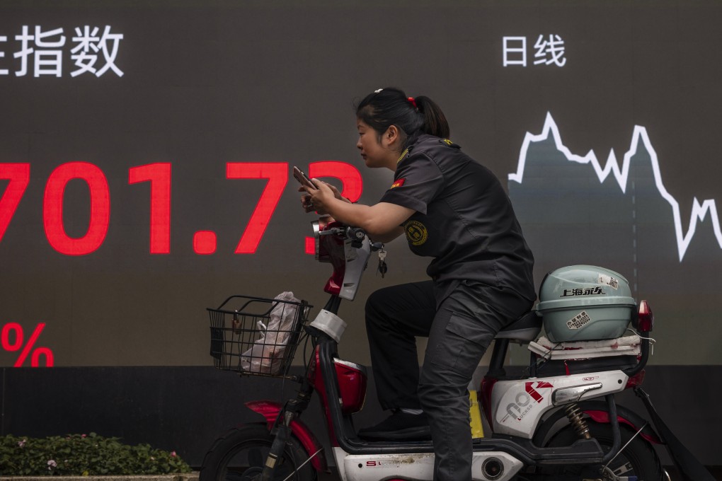 Stocks struggle to break past a six-week high as property developers slide after China expanded a trial to tax property owners in more cities. Photo: EPA-EFE
