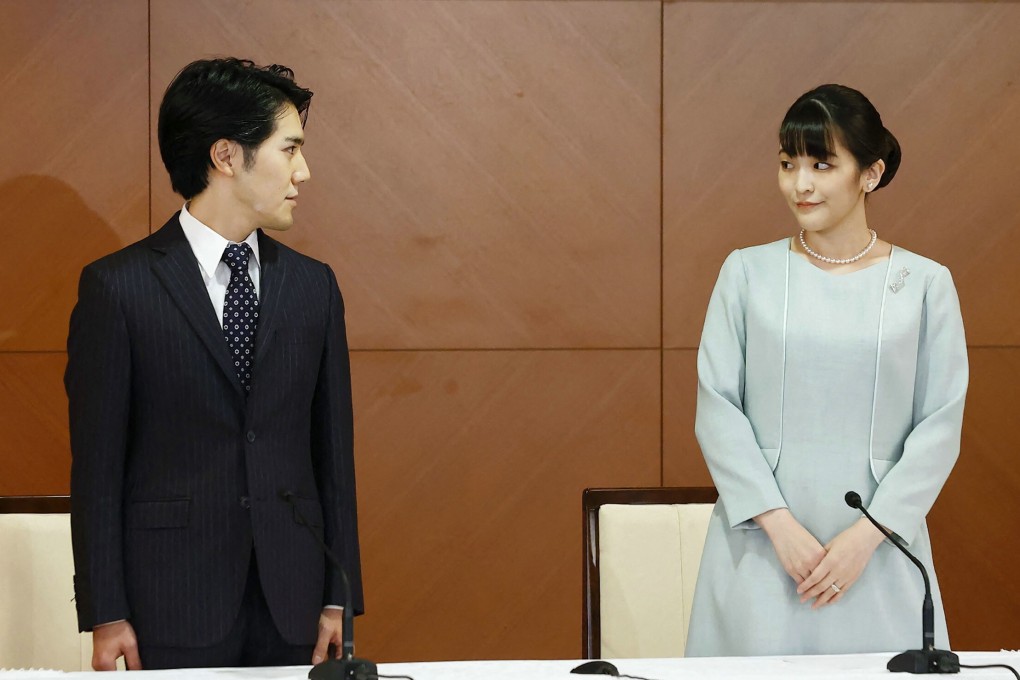 Former Japanese princess Mako and her husband Kei Komuro attend a news conference at a Tokyo hotel on Tuesday. Photo: AFP