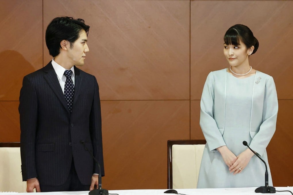 Former Japanese princess Mako and her husband Kei Komuro attend a news conference at a Tokyo hotel on Tuesday. Photo: AFP