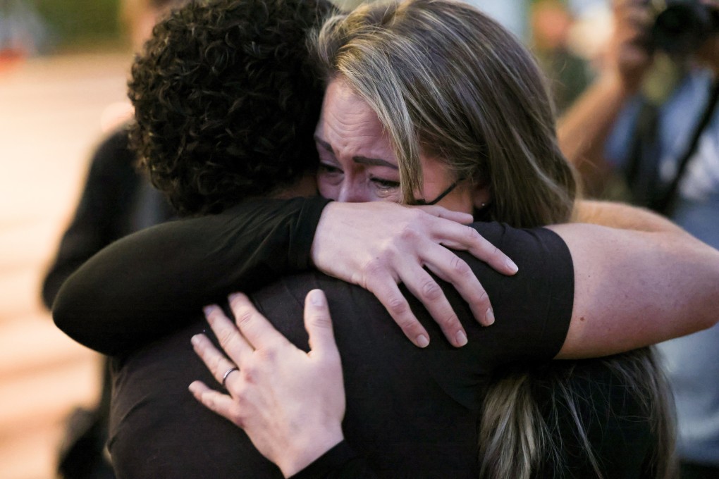 Members of the local film community mourn the loss of cinematographer Halyna Hutchins at a vigil in Albuquerque, New Mexico, on Saturday. Photo: Reuters
