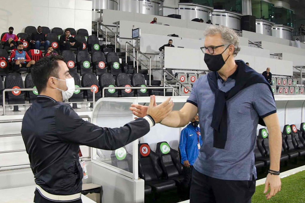 Current Al-Sadd coach Xavi Hernandez (left) is among the favourites to take over as Barcelona manager. Photo: AFP