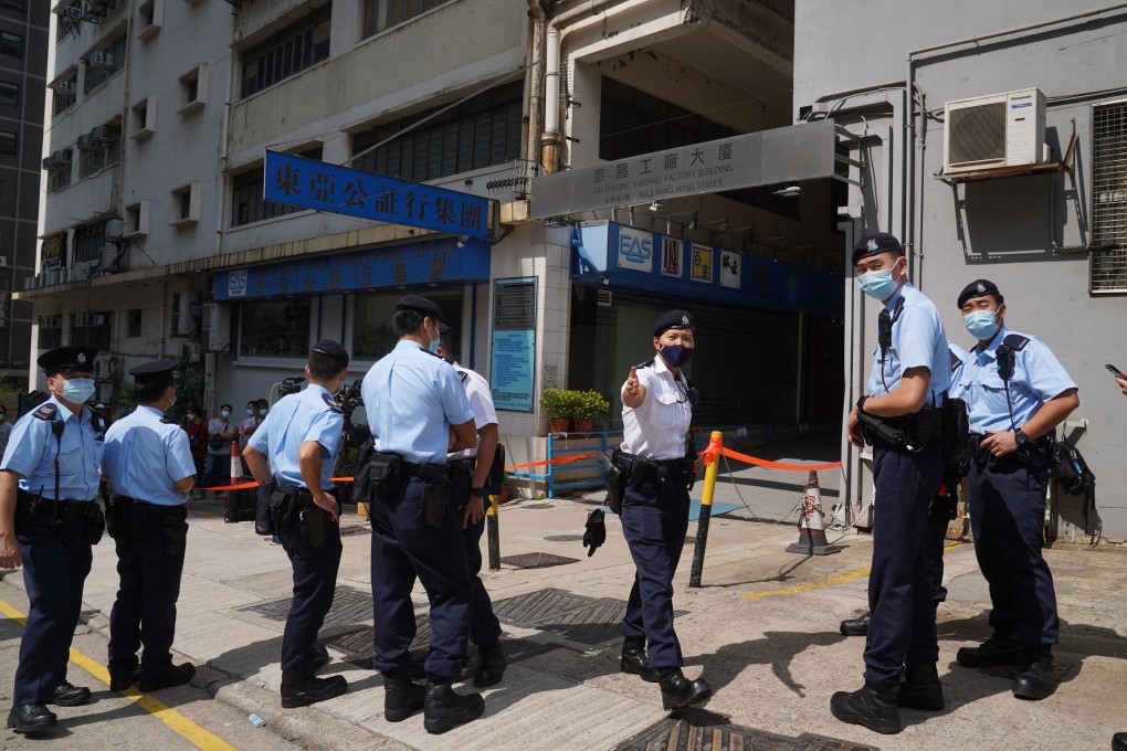 Police swoop on four locations on Thursday, among them the office of the League of Social Democrats in Cheung Sha Wan. Photo: Sam Tsang