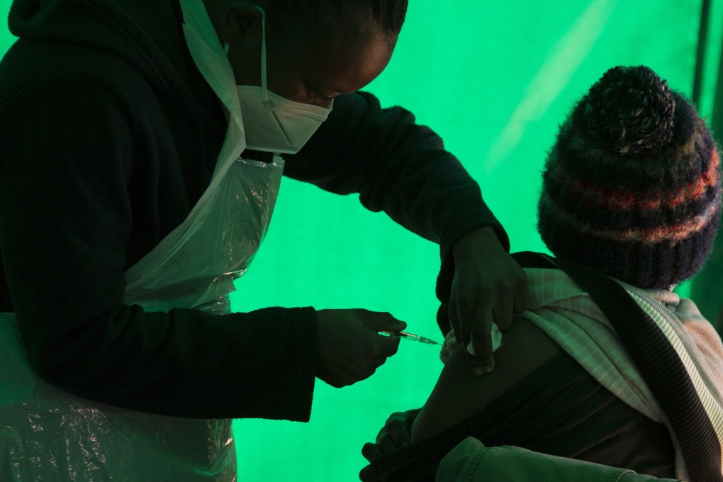 An elderly patient receives a dose of the Pfizer Covid-19 vaccine in Johannesburg, South Africa. File photo: AP