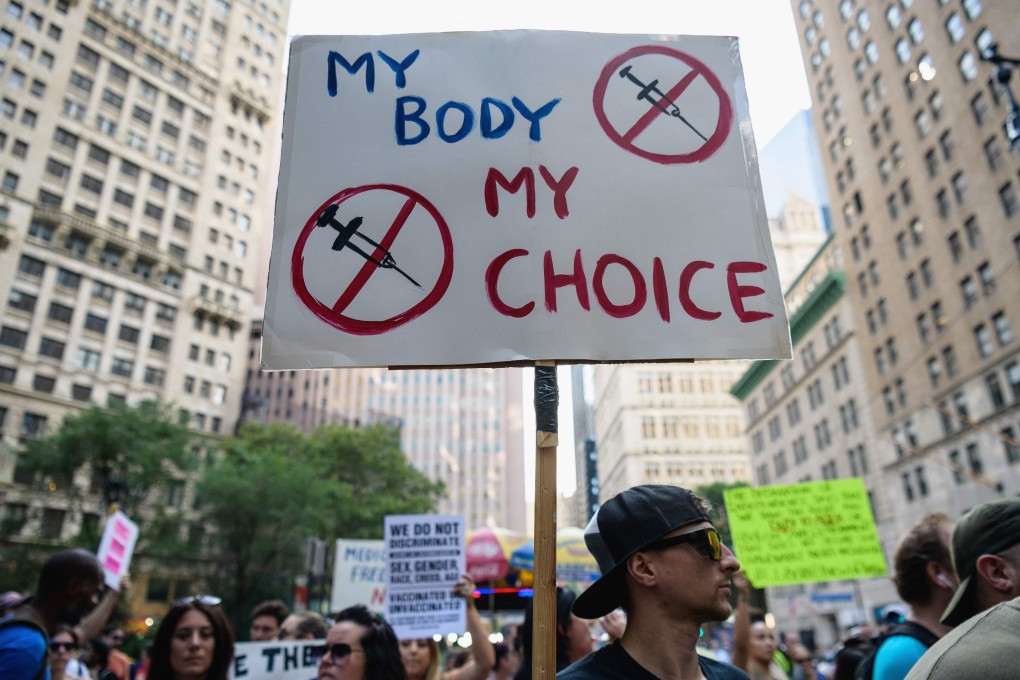 Protesters opposed to Covid-19 vaccine mandates and vaccine passports rally outside the City Hall in New York City. Photo: AFP