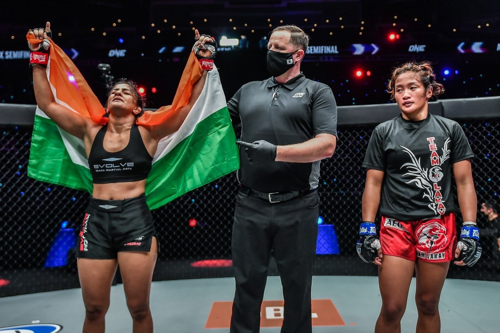 Ritu Phogat celebrates her unanimous decision victory against Jenelyn Olsim. Photos: ONE Championship