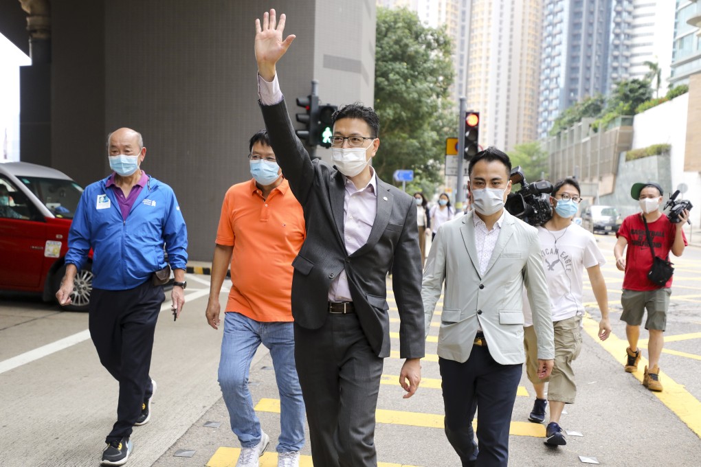 FTU president Stanley Ng waves to supporters on his way to submit his application. Photo: Xiaomei Chen
