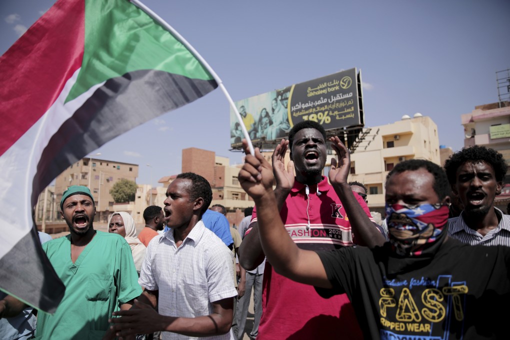 Pro-democracy protesters in Sudan call for the ousted government to be restored. Photo: AP